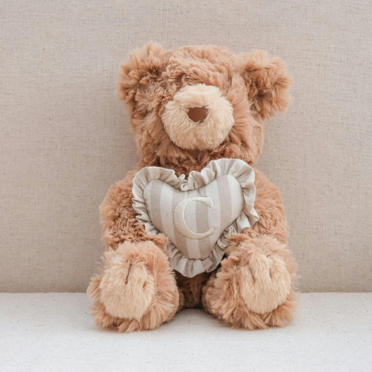 INITIAL TEDDY
