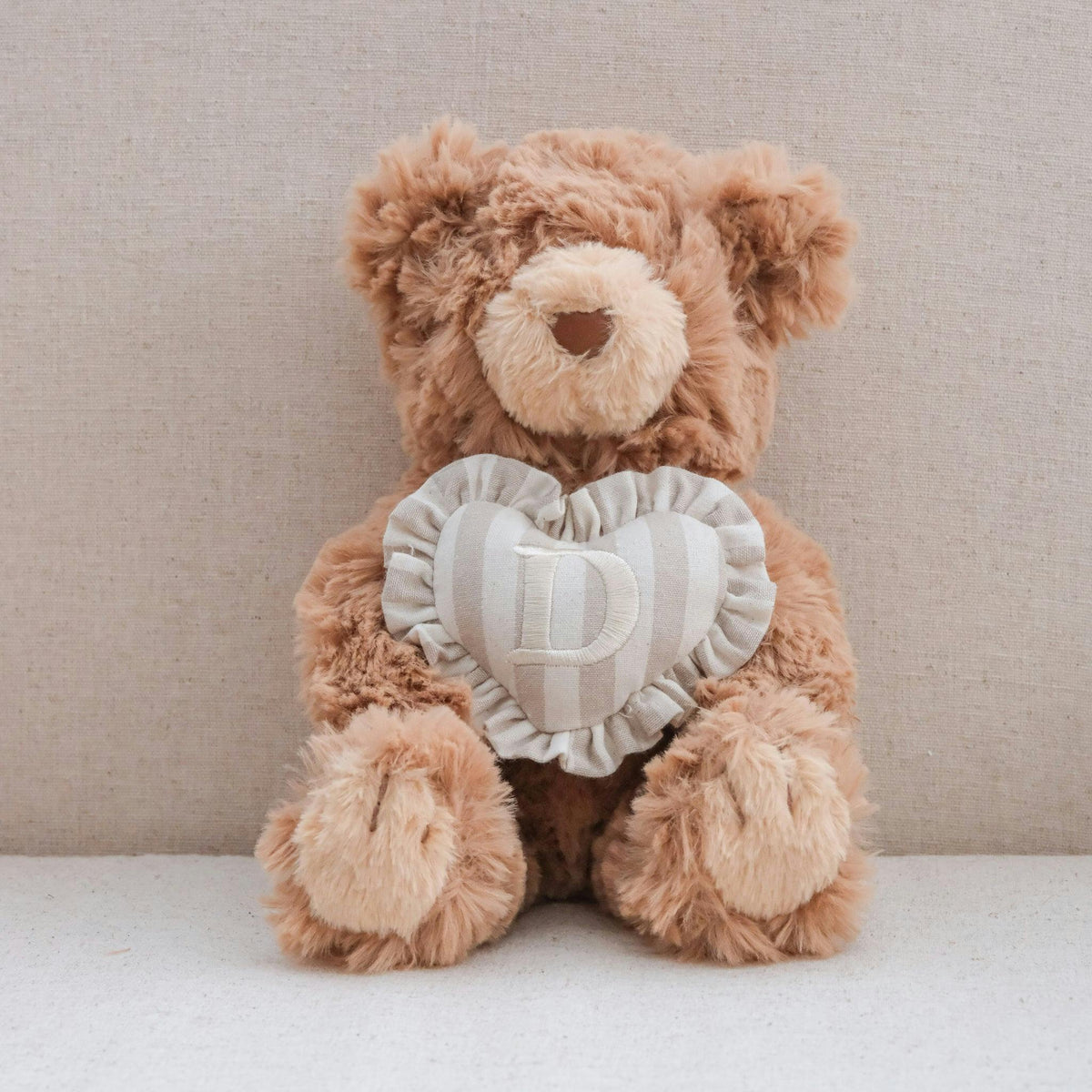 INITIAL TEDDY